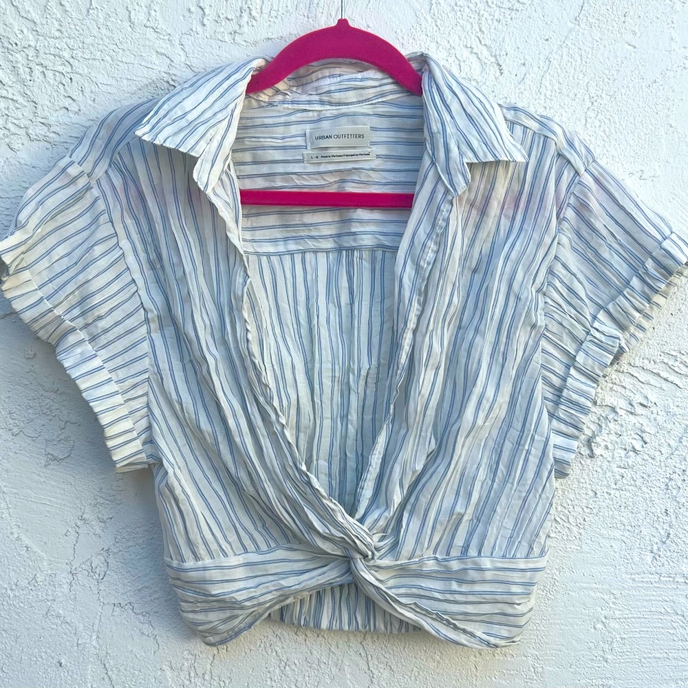 Cutest summer top from Urban Outfitters! Unique style that works w anything 🩵